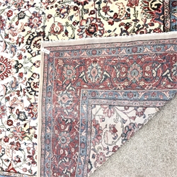 Persian Hamadan red and ivory ground rug, repeating border, central medallion in field of trailing foliage, 363cm x 270cm