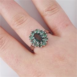 18ct white gold green sapphire cluster ring, oval cut sapphire of approx 1.40 carat, surrounded by ten round cut sapphires, Birmingham 2005, total sapphire weight approx 2.40 carat