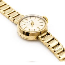 Ernest Borel ladies 9ct gold manual wind presentation wristwatch, silvered dial with baton hour markers, retailed by Mappin, on integral 9ct gold bracelet, London 1962