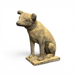 Cast stone garden statue in the form of a seated Jack Russell Terrier on a rectangular base