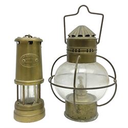 Ships brass onion oil lamp, with clear glass globular shade and wedge burner, together with a Lamp & Limelight miners lamp, tallest H25cm