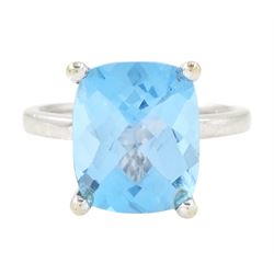 18ct white gold blue topaz ring, four claw set with a single cushion briolette cut Swiss b...