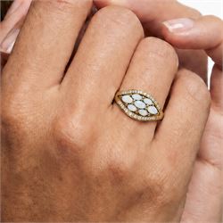 9ct gold opal and diamond cluster ring, seven marquise cut opals, surrounded by diamond chips, in a pierced design setting, Birmingham 2004