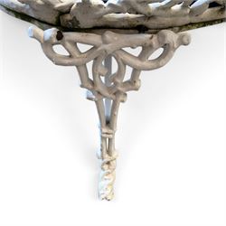Victorian revival cast two seat garden bench, scrolling lattice back with flower heads, terminating to rams heads arms, curved pierced seat, finished in antique white paint