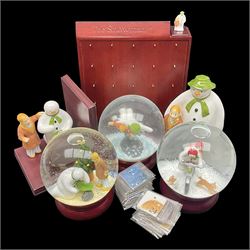 Coalport Characters The Snowman, comprising three snowglobes, Advent calendar, bookend and money box  