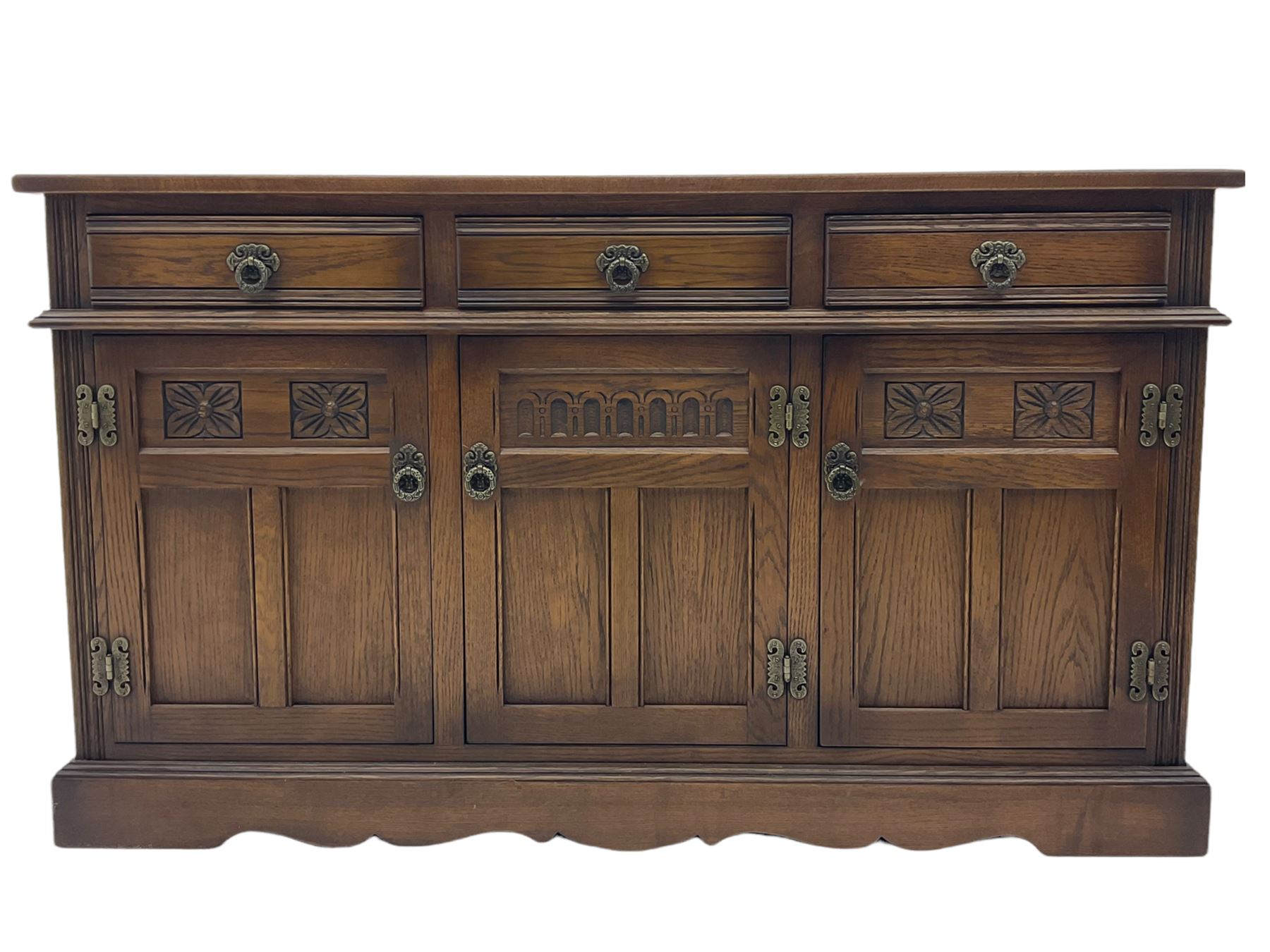 Old Charm Tudor style oak three drawer sideboard