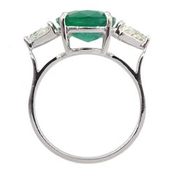 18ct white gold three stone oval emerald and trilliant cut diamond ring, stamped K18, emerald approx 3.90 carat, total diamond weight approx 0.60 carat