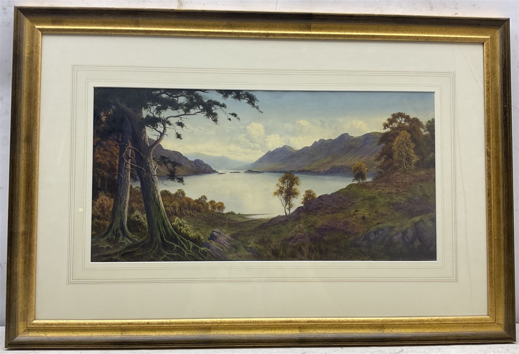 Edward Horace Thompson (AKA Donald A Paton) (British 1879-1949): 'Loch Ailort - Early Autumn', watercolour signed with pseudonym 30cm x 60cm 
Provenance: private collection, purchased James Alder Fine Art, Hexham. Thompson used the name Donald Paton when he painted Scottish scenes, presumably for a different agent than the name he used for his more common Lake District views.