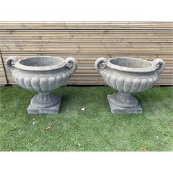 Pair of squat cast stone garden urns, with handles on pedestal  base, D50, H45 - THIS LOT IS TO BE COLLECTED BY APPOINTMENT FROM DUGGLEBY STORAGE, GREAT HILL, EASTFIELD, SCARBOROUGH, YO11 3TX