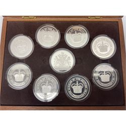 The Birmingham Mint 'The Queens Of The British Isles' sterling silver hallmarked nine medal set, housed in a fitted case, overall combined weight of the medals approximately 400 grams