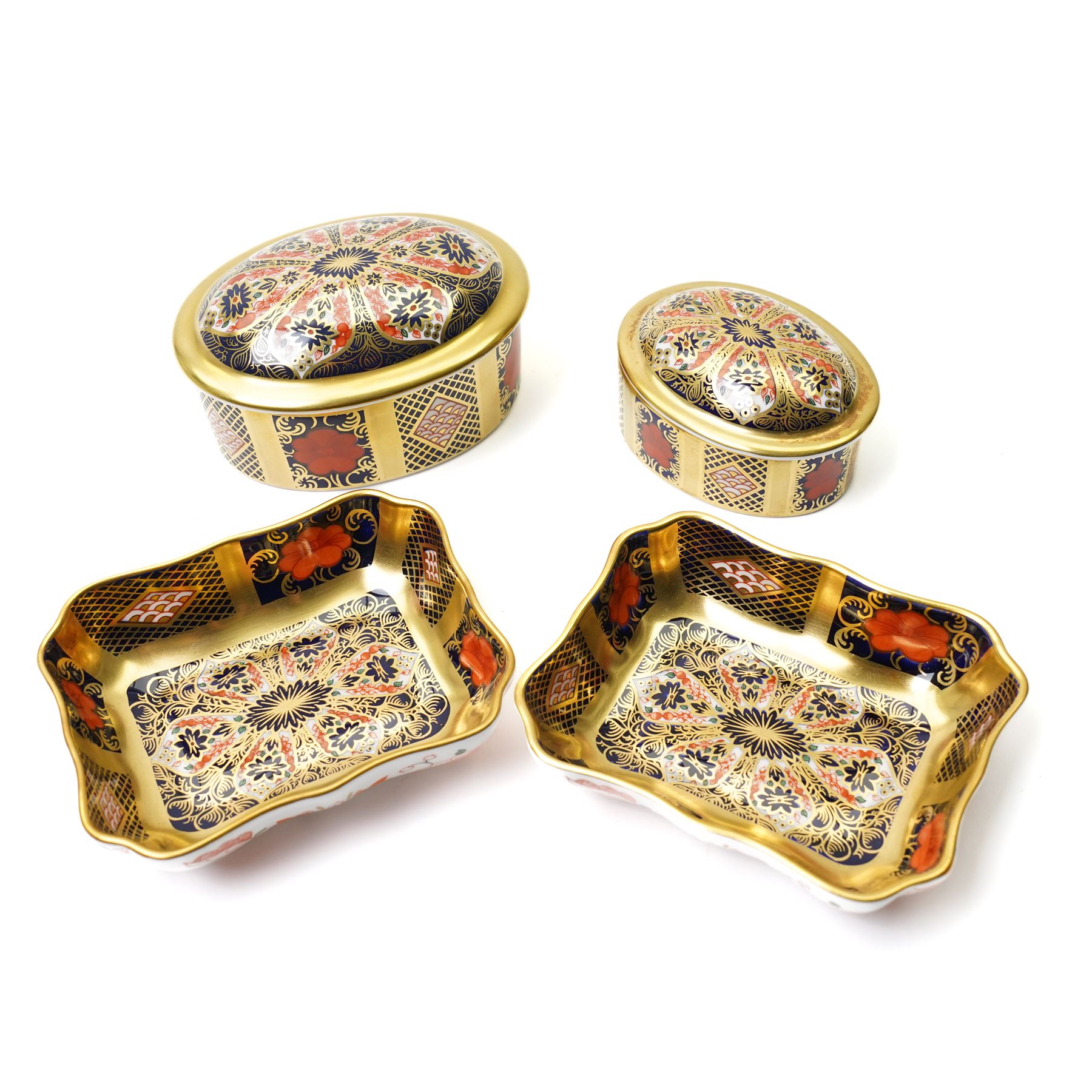 Pair of Imari pattern 1128 trays, of rectangular form, W9.5cm; together with two covered oval boxes, Old Imari pattern 1128, larger W10cm (4)