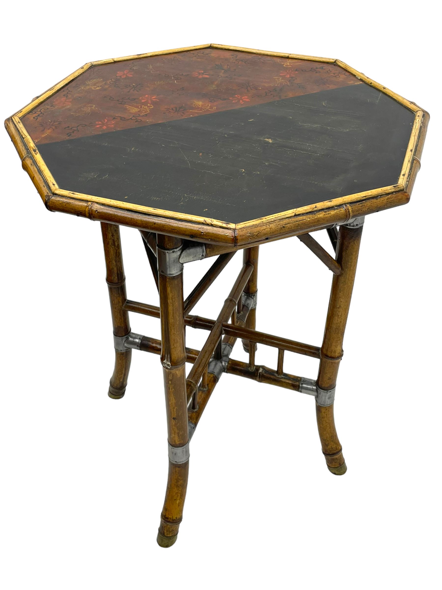 W.F. Needham - Victorian bamboo occasional table, octagonal lacquered top, the bamboo joined by metal brackets, brass cups stamped 'W.F Needham'