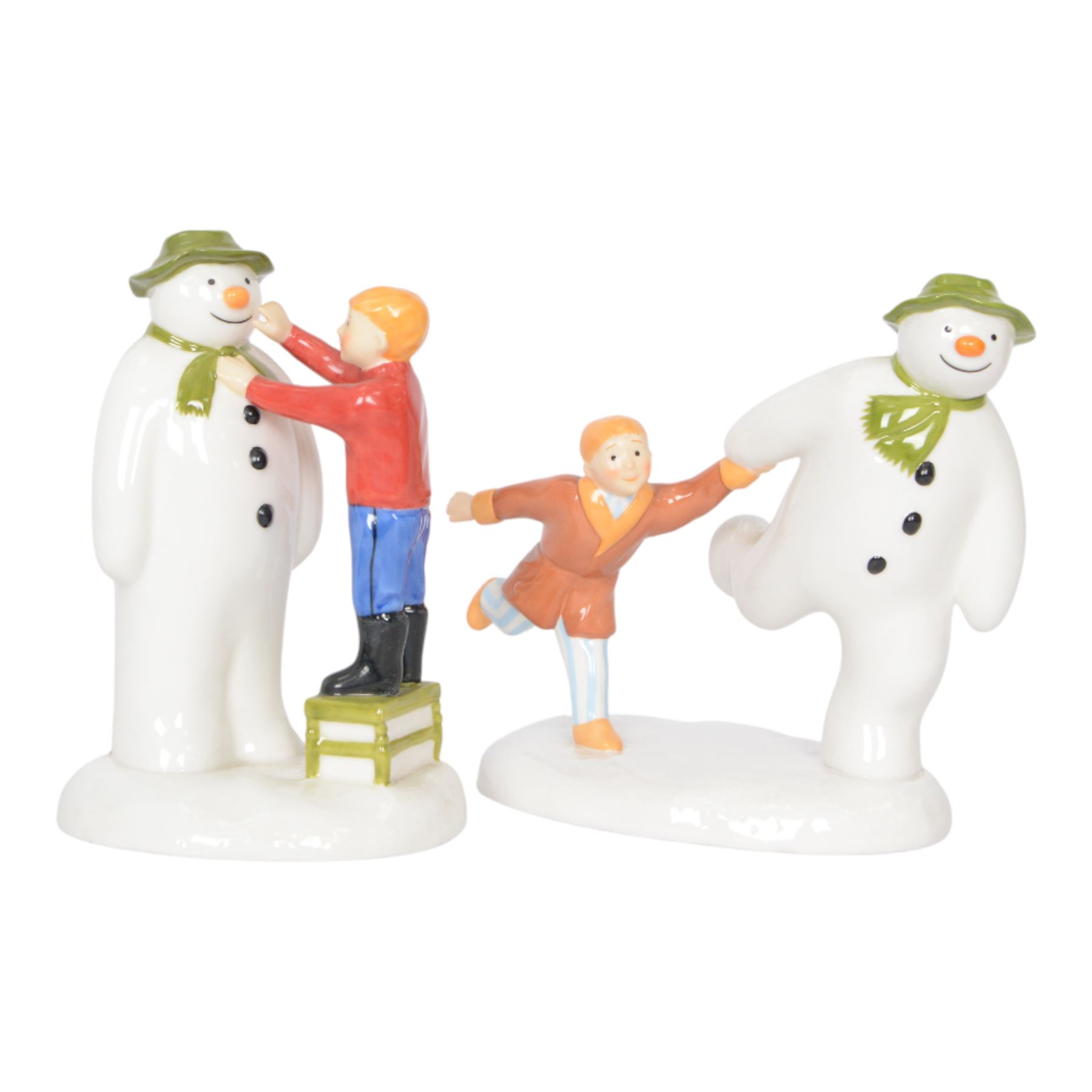 Five Coalport The Snowman figures, comprising Adding a Smile, Walking in the Air, Snowman's Surprise, The Adventure Begins and The Hug, three boxed