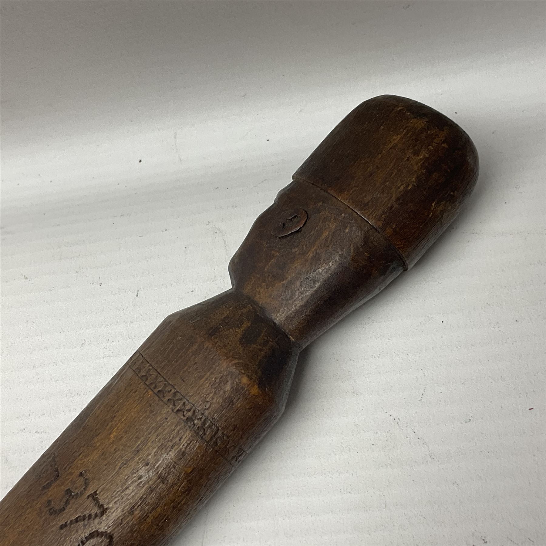 WW1 Prisoner of War carved beech walking cane, the terminal as a head wearing a helmet, and inscribed 'Souvenir from 370th PoW Coy Menin 1919'; bears metal plaque with indistinct monogram L91cm