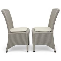 Neptune – Sheldrake limed oak extendable dining table and eight Havan loom chairs, the oval top in limed oak finish with four additional leaves extending the table to seat up to ten (Extends to cm), raised on turned legs with two additional centre supports, the matching Havan loom chairs finished in grey with cream upholstered seat covers (H 95cm, W 47cm, D 55cm)