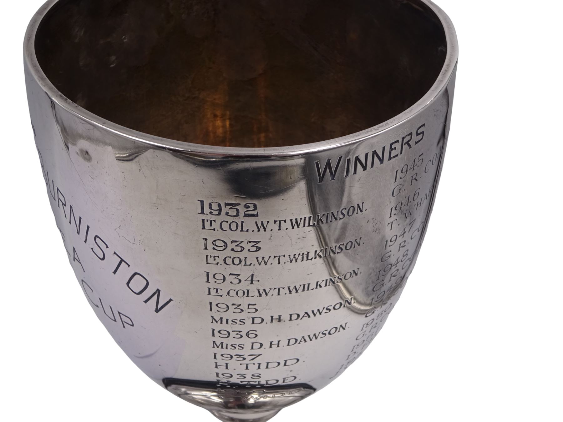 1930s silver trophy cup, of plain form, upon knopped stem and circular stepped foot, body with presentation engraving 'Cloughton and Burniston Sweet Pea Challenge Cup' with winners engraved verso, hallmarked Walker & Hall, Sheffield 1931, upon ebonised base, including base H28.7cm