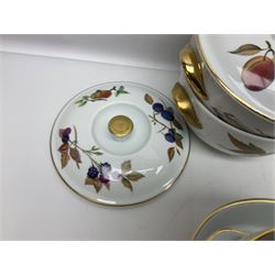 Royal Worcester Evesham pattern, including covered pot de cremes, twin handle tureen, serving dishes, flan dishes, side plates etc  