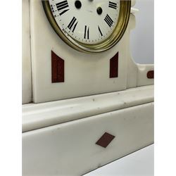 Late 19th century eight-day French mantle clock in a white marble case with contrasting rouge marble inserts to the front, round topped case with carved volutes and  conforming sidepieces, on a deep rectangular plinth, with a rack striking movement striking the hours and half hours on a bell, 4-3/4”  enamel dial with Roman numerals, minute markers and steel spade hands, flat bevelled glass within a cast bezel, retailers name “Bracher & Sydenham, Reading” inscribed on the dial, with pendulum. 



