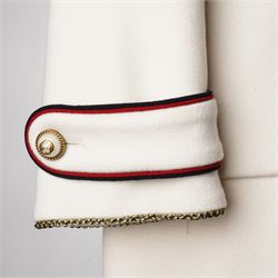 Gucci - bee embroidered wool single-breasted military coat, from the Autumn/Winter 2017 collection under Alessandro Michele, in ivory, with stand collar, red and navy trim, pearlescent and gold-tone button fastening and embroidered bee detailing to the collar, size 14, unused with original garment bag and tags