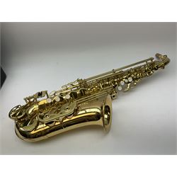 A gear4music brass tenor saxophone serial no.15080448 L67cm in fitted carrying case with accessories and music books