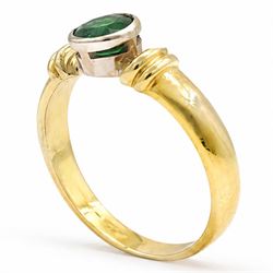 18ct gold tsavorite garnet ring, bezel set with a single round cut garnet, Birmingham 1992