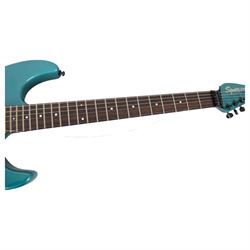Squier by Fender Stagemaster six string electric guitar, in metallic green finish, serial no. KC00124999, L102cm