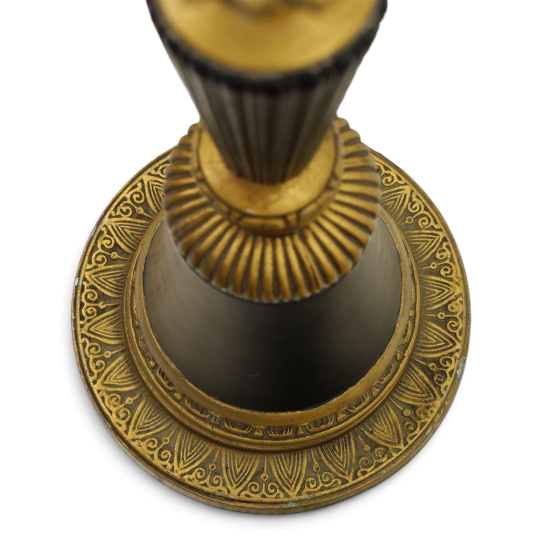 Neoclassical design table lamp, black painted and gilt metal column with fluted central section, foliate and stiff leaf cast decoration, on circular spreading base, fitted with shade frame