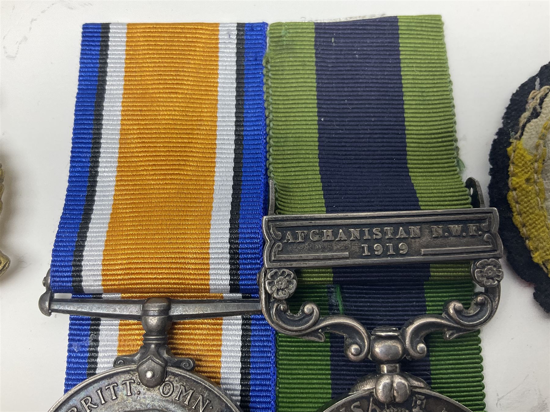 George V India General Service Medal with Afghanistan N.W.F. 1919 clasp and WW1 British War Medal awarded to 79561 Pte. R.D. Rowbottom R.A.M.C.; both with ribbons; card mounted with cap badge and Medical Corps cloth badge
