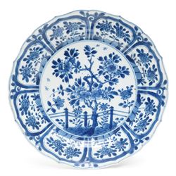 18th century Chinese Kangxi period blue and white plate, decorated with blossoming tree an...