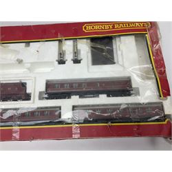 Hornby '00' gauge - LMS Express Passenger Set with Duchess Class 4-6-2 locomotive 'Duchess of Sutherland' No.6233 with tender and four coaches; Inter-City 125 Set with Class 43 HST125 locomotive and dummy and two coaches; and Lima '00' gauge set with Class 33 Diesel Bo-Bo locomotive No.D6524, two coaches and car transporter; all boxed; together with a quantity of track, controllers etc