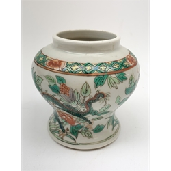 Chinese Qing Dynasty Famille Verte  jar and cover decorated with Dragons and butterflies amongst foliage H15cm