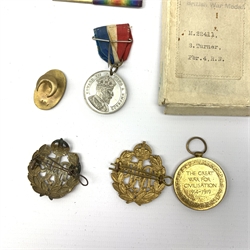 King George V 1914 - 1918 British War Medal named to '14-133 PTE J.W. ROBSON. E. YORK R', War Medal named to 'M. 22411 S. TURNER. PBR. 4 R.N.', Victory Medal and 1914-15 star both named to '3408 PTE. G. COLLINSON. W. YORK. R.' and various badges etc