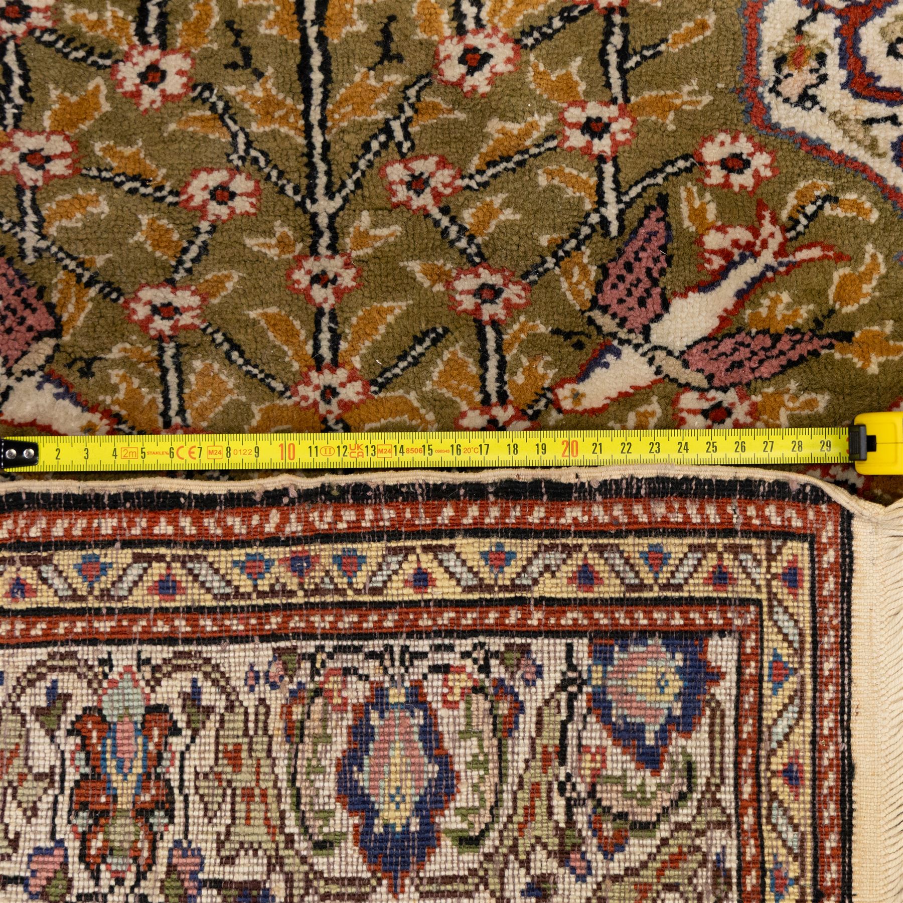 Afghan Ziegler rug, terracotta field with an all-over design of palmettes and stylized foliage in soft beige and gold tones, with a Persian Qum silk prayer rug, with a central tree of life and flowering branches and birds, within multiple floral borders, 88x125cm (2)