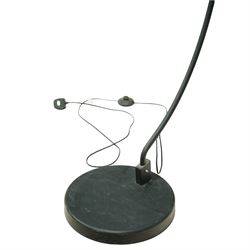 Contemporary black painted floor lamp, domed black shade with gold leaf effect interior, on a circular weighted base