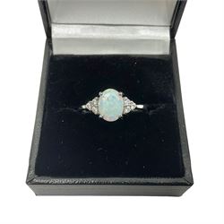 Silver opal and cubic zirconia cluster ring, stamped 925, boxed 