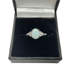  Silver opal and cubic zirconia cluster ring, stamped 925, boxed 