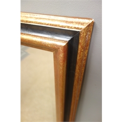  Rectangular bevel edged mirror in black lacquered and gilt frame, W71cm, H101cm  