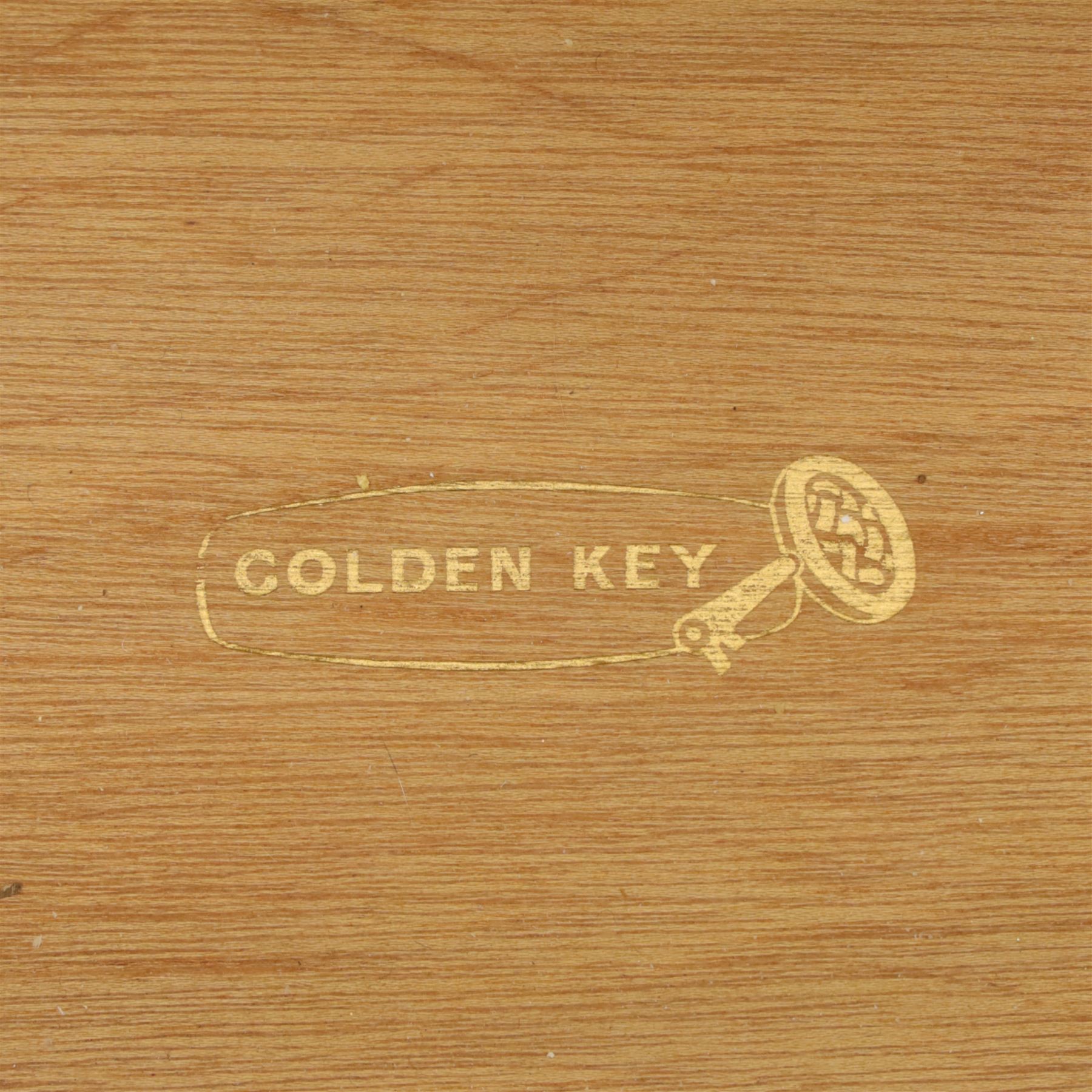 Golden Key By Palatial Ltd - mid-20th century teak chest of five drawers, rectangular top over a bank of graduating drawers fitted with brass loop handles, raised on tapering support
