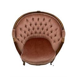 French style beech framed armchair, curved form with moulded frame, on cabriole supports carved with flower heads