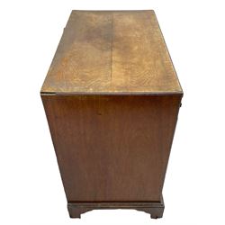 George III mahogany chest, banded caddy top with moulded edge, brushing slide over four graduating cock-beaded drawers, ornate cast gilt metal handle plates and escutcheons, swan neck handles cast with dolphins, shells and C-scrolls, lower moulding over bracket feet