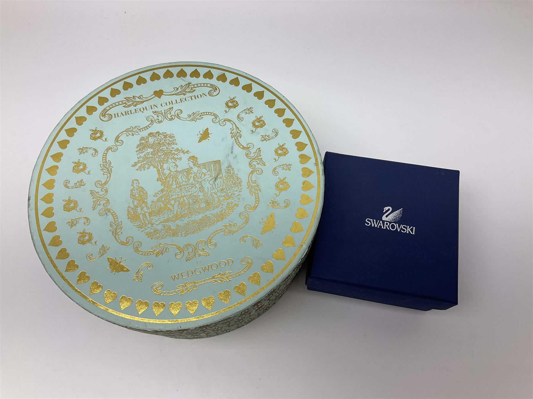 Wedgwood Yellow Ribbons cabinet cup and saucer, boxed and a Swarovski butterfly, boxed (2)