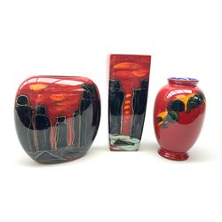 A Poole Pottery vase, of ovoid form decorated with green and yellow forms upon a red glazed ground, H20cm, together with two Anita Harris Art Pottery vase, with similar decoration. 