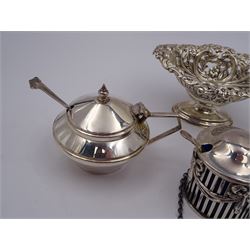 Group of silver, comprising Gin decanter label, embossed with vine leaves, pierced and embossed open salt, and three mustard pots and covers, each with blue glass liners and matched silver spoons, all hallmarked 