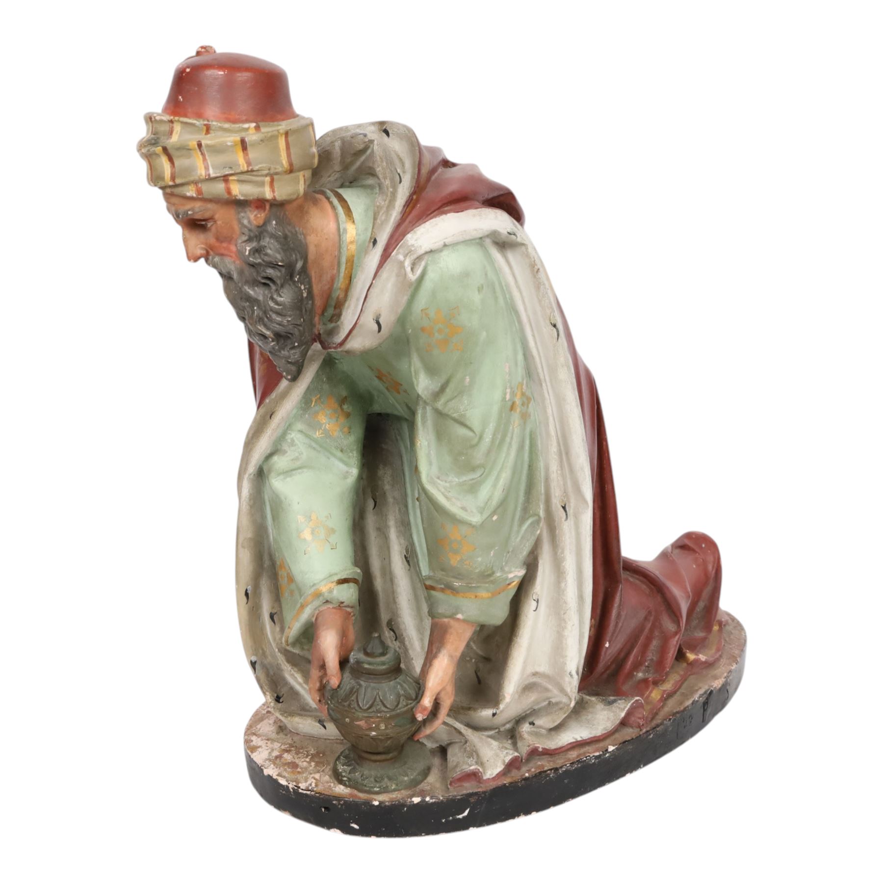 20th century painted plaster icon figure depicting one of the three wise men from a nativity sceen, kneeling and presenting his gift, H54cm 