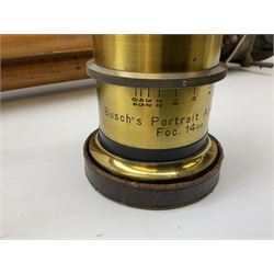 Thornton Pickard folding plate camera in mahogany and lacquered brass, no.529946 and no.529947, field model with canvas wrapped box, three mahogany photographic plates, 'Busch's Portrait Aplanat No4 Foc.14inc' lens and a wooden tripod