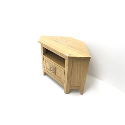 Light oak corner television stand, single shelf above two cupboard doors, stile supports