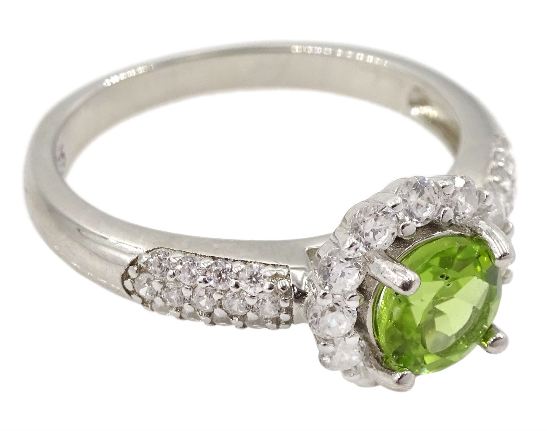 Silver peridot and cubic zirconia flower cluster ring, stamped 925