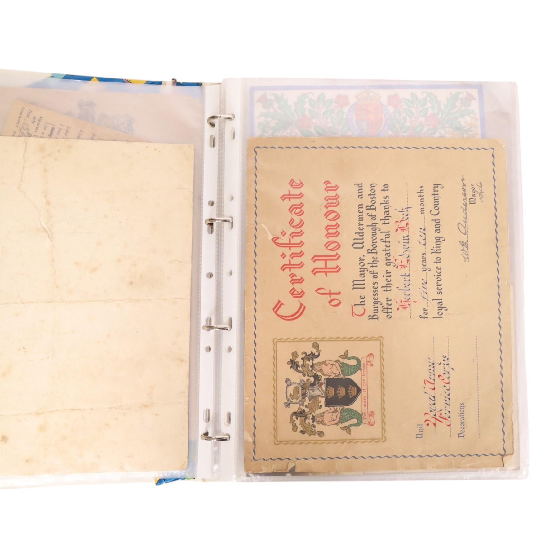 Collection of WWII ephemera, including photographs, postcards, identification cards, telegrams, newspapers 