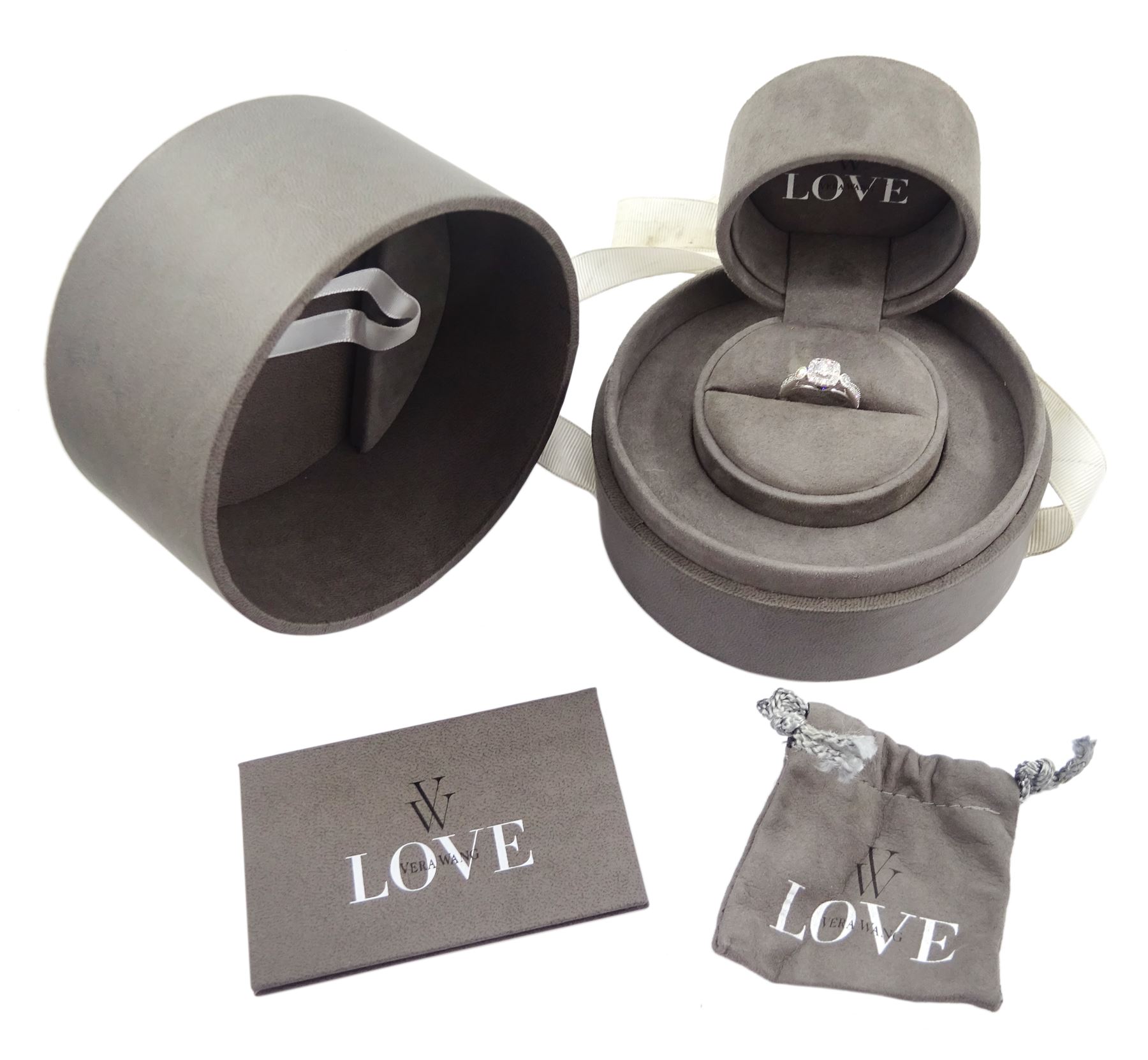 Vera Wang 18ct white gold diamond and sapphire 'Love' ring, round brilliant cut diamond cluster, with diamond set shoulders and sapphire set gallery, total diamond weight 0.70 carat, boxed