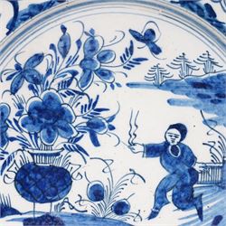 18th century English Delft dish, possibly Lambeth decorated with Chinese figure in a landscape D35cm